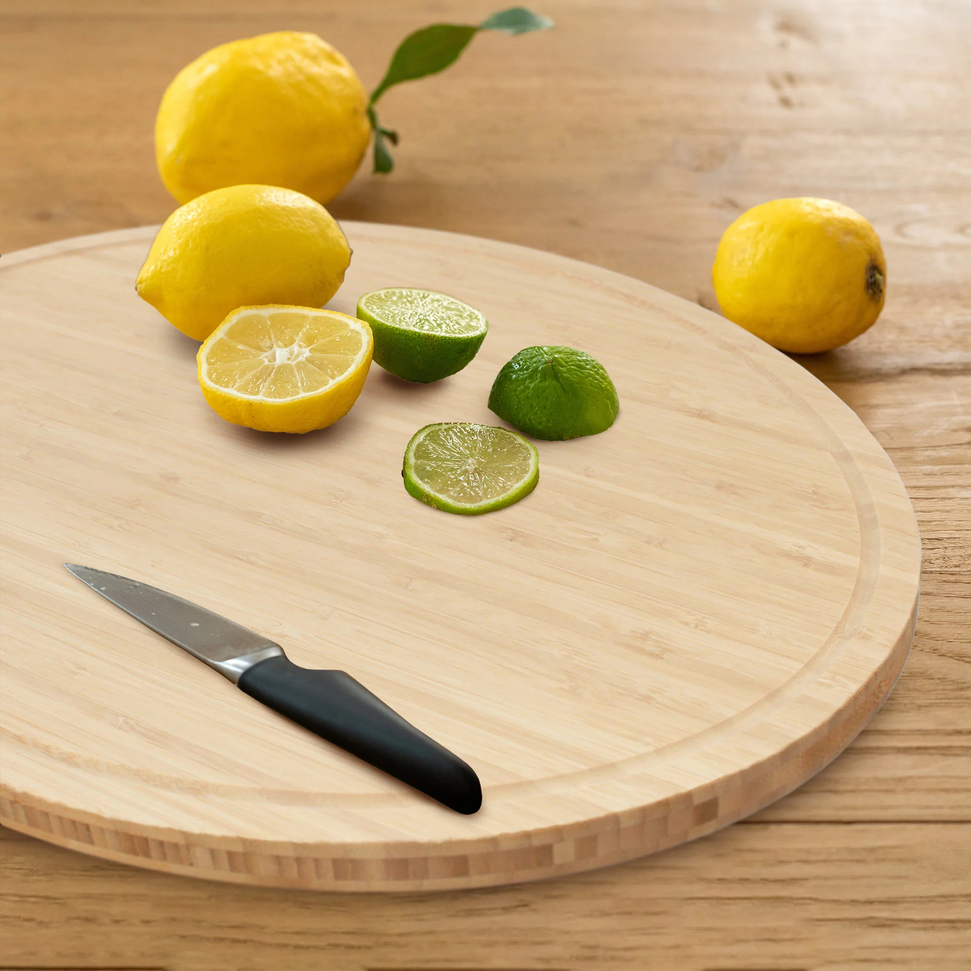 Grooved Oval Bamboo Cutting Board - Image 6